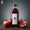 Premium Iranian pomegranate juice in a glass bottle by Raymand Kala, ready for B2B export